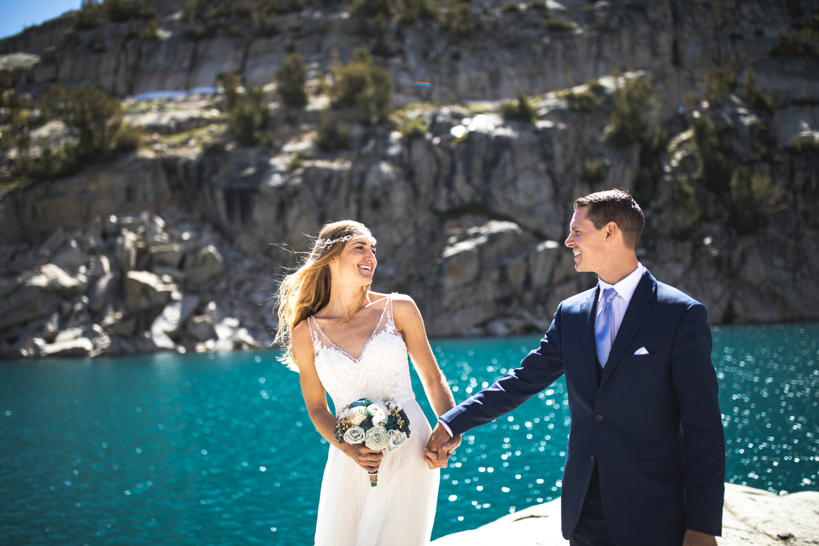 Couple during a Sierra Nevada backcountry elopement with sweeping mountain scenery